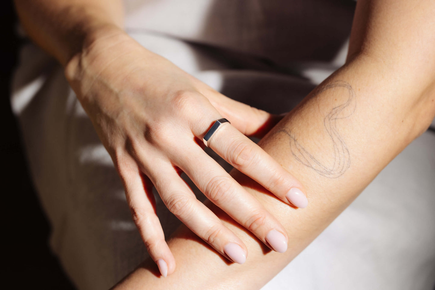 signet ring tattoo