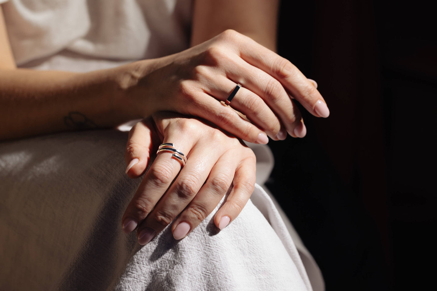 silver rings on finger